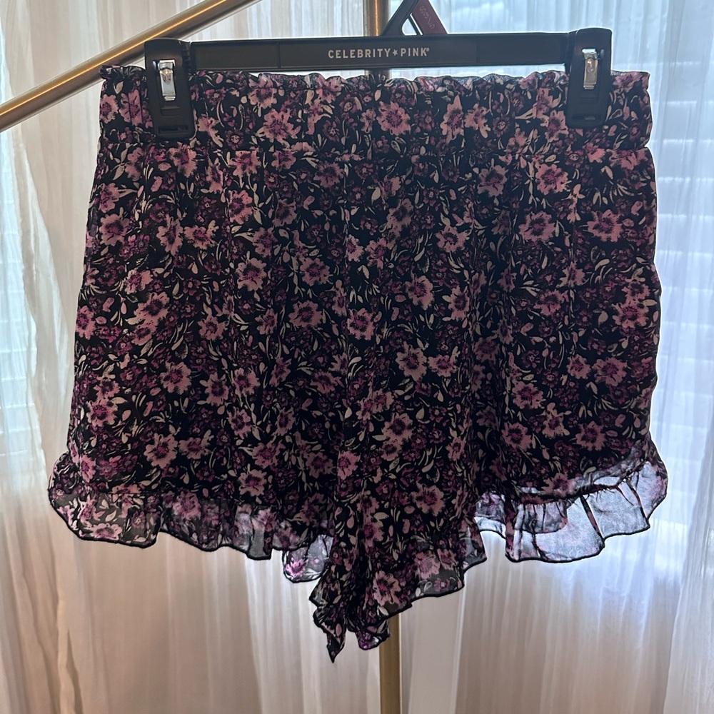 Francesca’s mi ami Black and Purple Floral ruffle Shorts with pockets medium